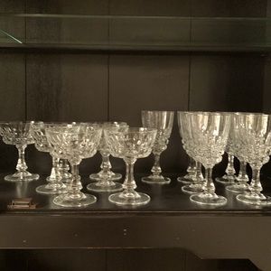 8 crystal champagne glasses and 8 crystal wine glasses